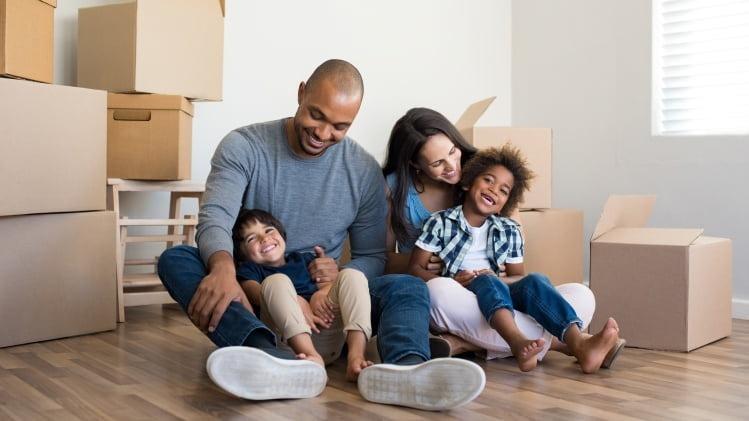 Family moving with boxes